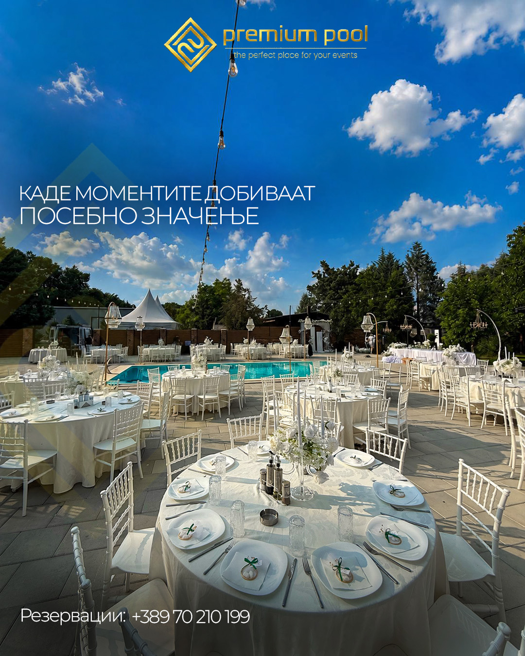 Premium Pool outdoor event space with round tables, white chairs and a pool under a bright blue sky.