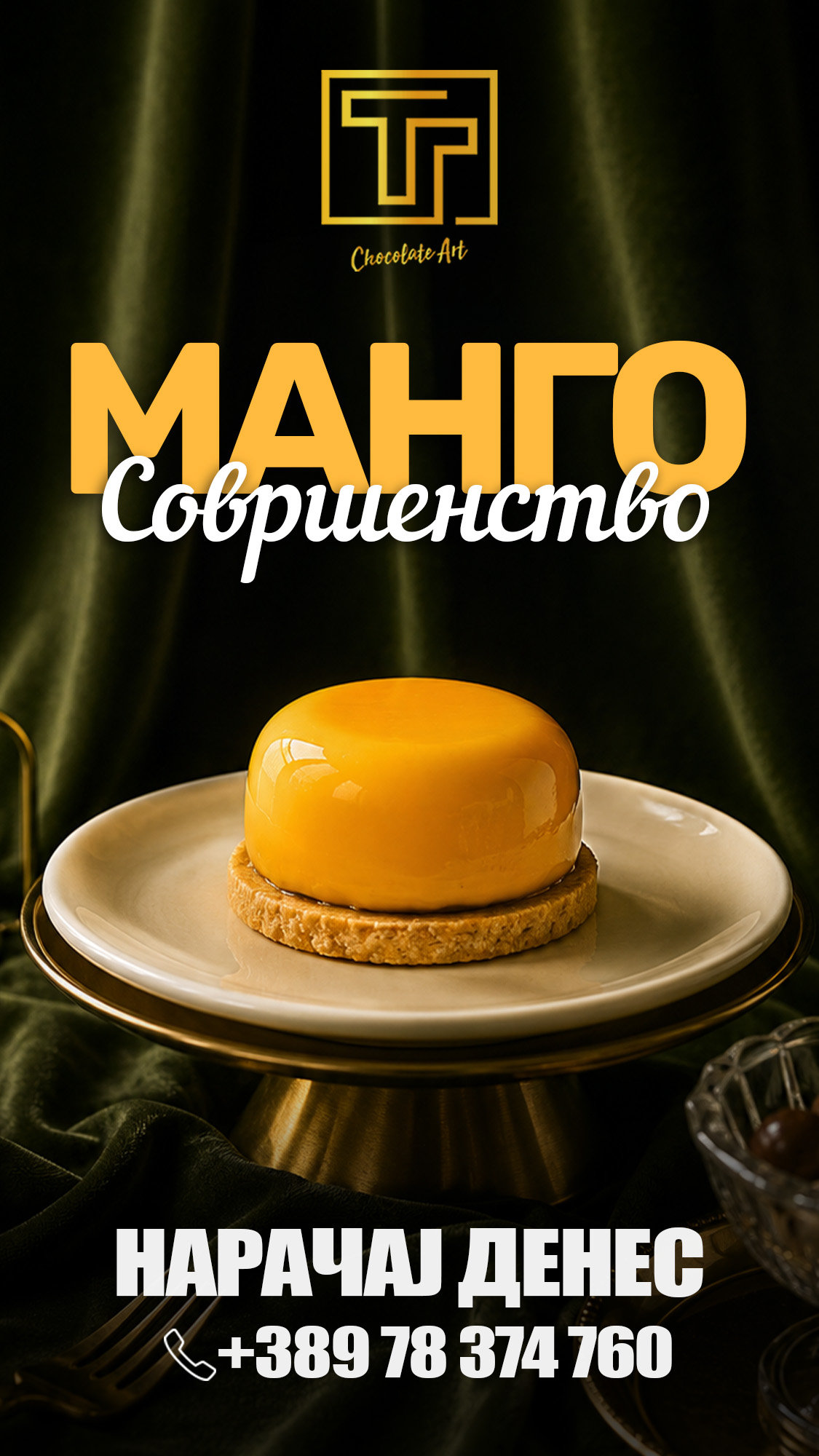 Yellow mango dessert against dark green fabric with gold TT Chocolate branding.